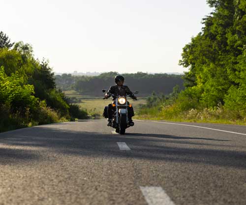 full-shot-man-riding-motorbike